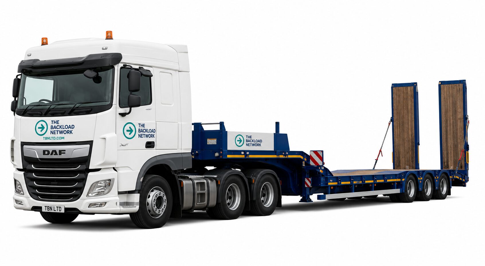 White DAF truck with lowboy flatbed trailer